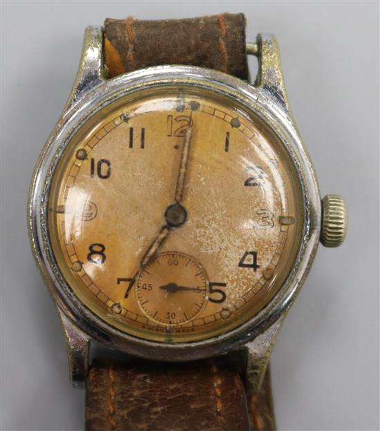 A 1940s? British Army military issue stainless steel manual wind wrist watch.